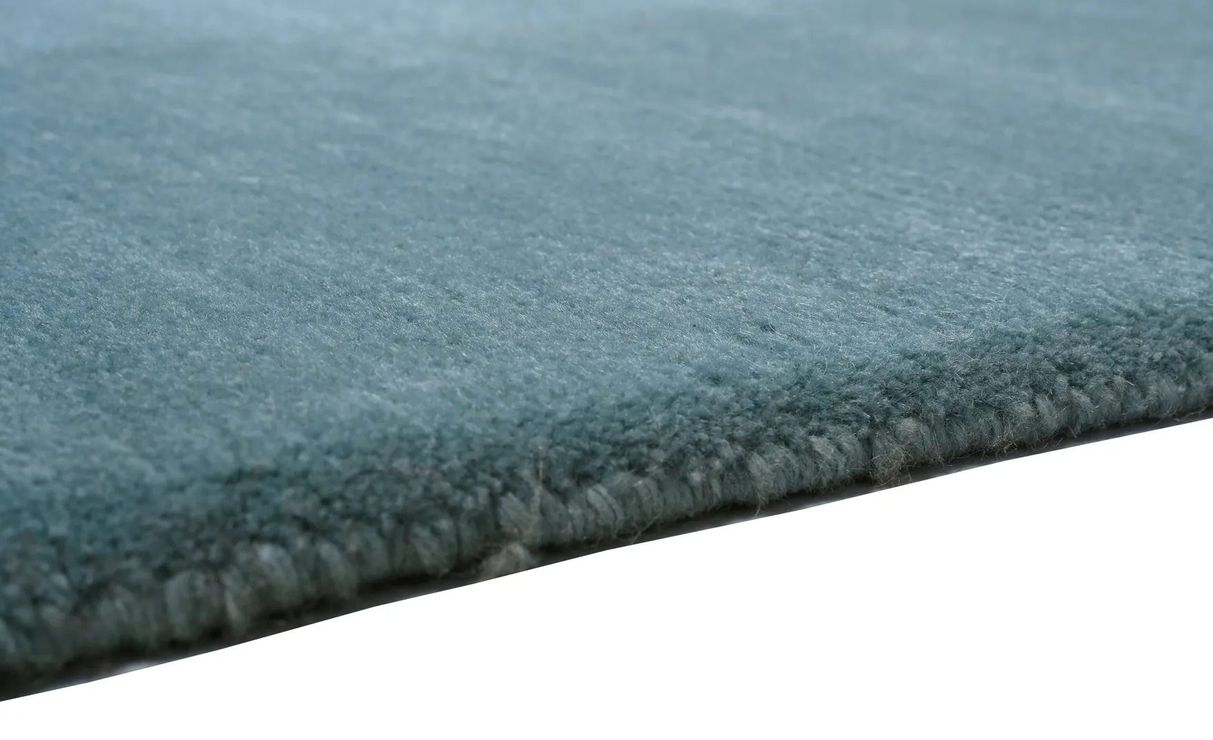 Handgeknüpfter Tibeter Teppich in grün mit Retro Bordüre – Neuwertig
