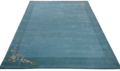 Handgeknüpfter Tibeter Teppich in grün mit Retro Bordüre – Neuwertig