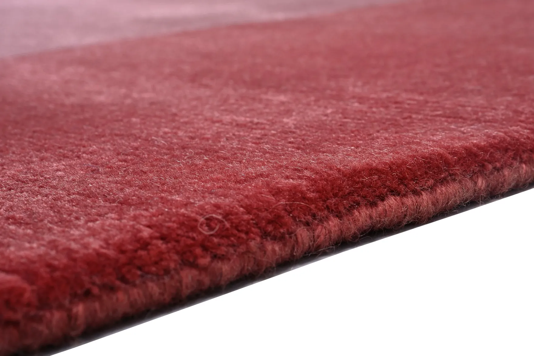 Handgeknüpfter Tibeter Teppich in red berry mit Retro Bordüre – Neuwertig