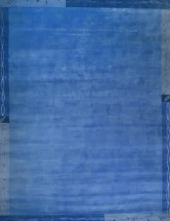 Handgeknüpfter tibetischer Teppich in blau mit Retro Bordüre – Neuwertig