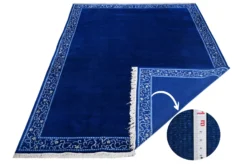 Handgeknüpfter tibetischer Teppich in blau mit Retro-Bordüre – Neuwertig