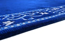 Handgeknüpfter tibetischer Teppich in blau mit Retro-Bordüre – Neuwertig
