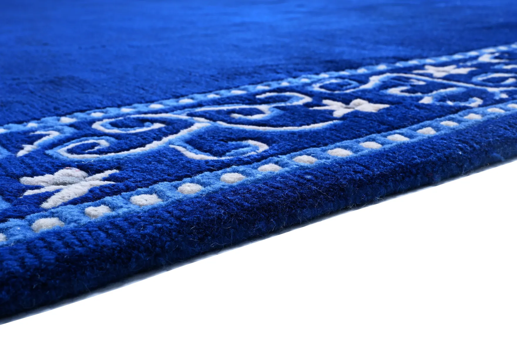 Handgeknüpfter tibetischer Teppich in blau mit Retro-Bordüre – Neuwertig