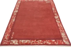 Handgeknüpfter tibetischer Teppich in rot mit Retro Bordüre – Neuwertig