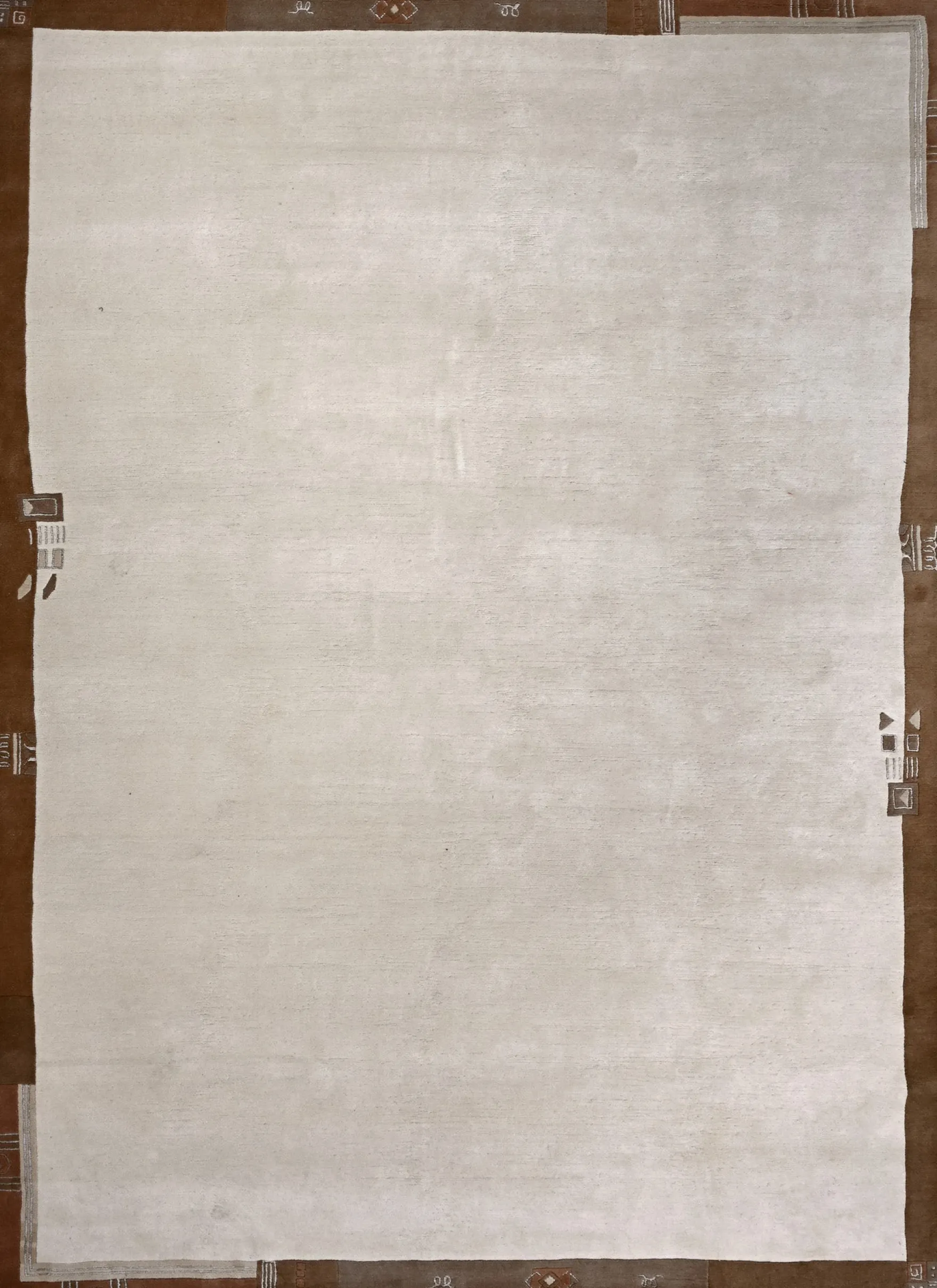 Handgeknüpfter Tibet Teppich in beige mit schmaler Retro Bordüre – Neuwertig