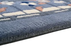 Handgeknüpfter Tibet Teppich in blau mit Retro-Bordüre – Neuwertig
