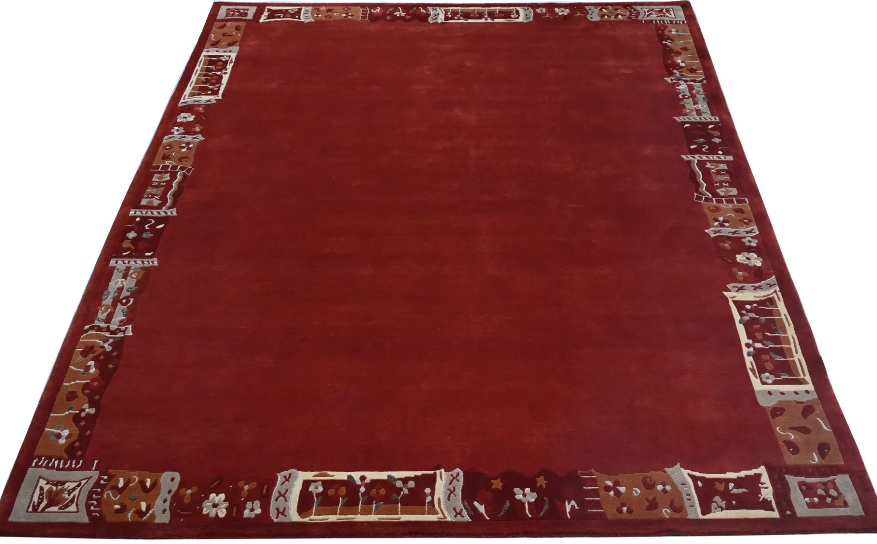 Handgeknüpfter Tibet Teppich rot mit Retro Bordüre – Neuwertig