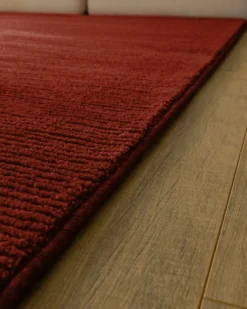 Kurzflor Teppich aus Schurwolle Purpur Rot