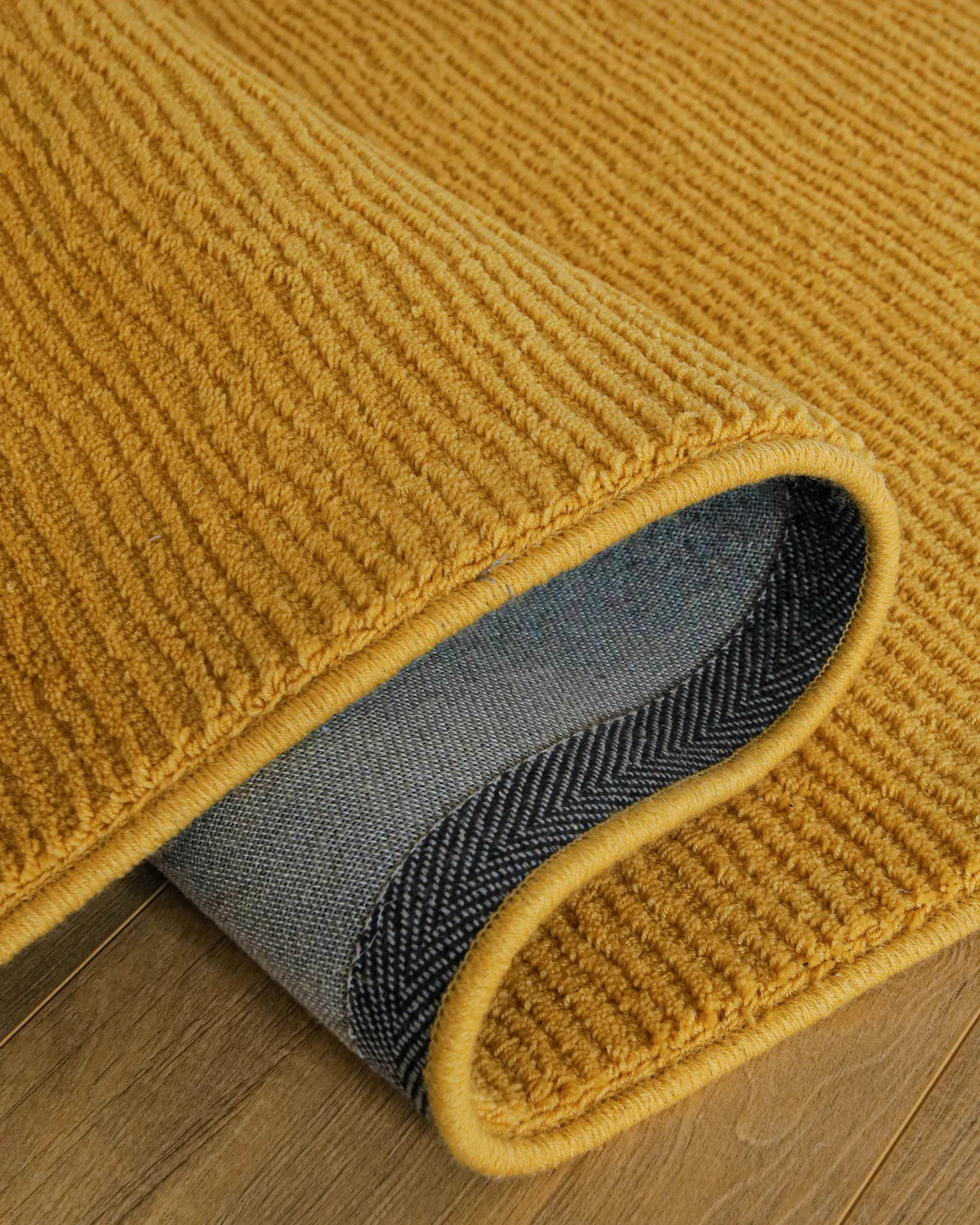 Kurzflor Teppich aus Schurwolle Gelb "Castello ONE" WECONhome